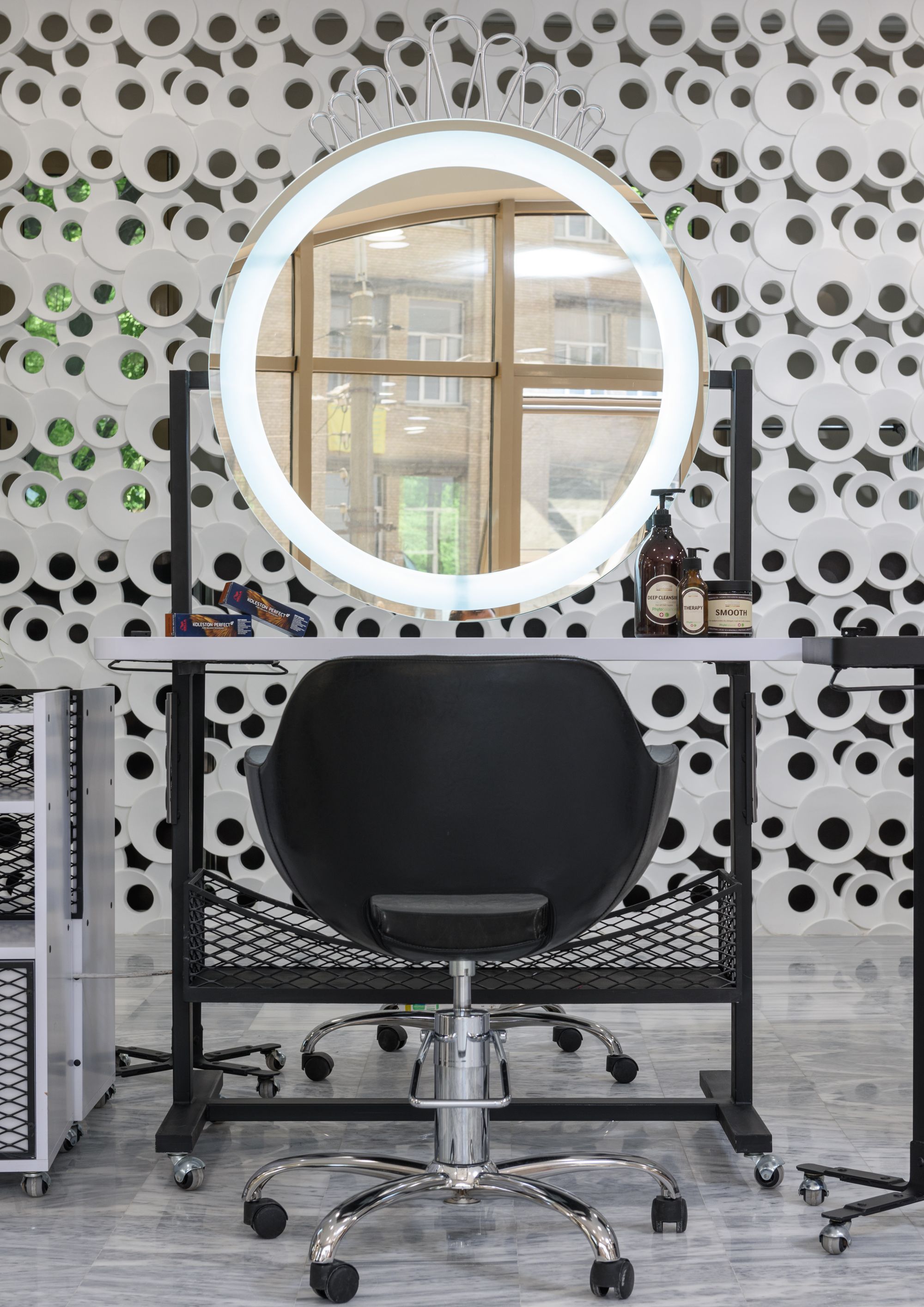 Chair and mirror with a ring light